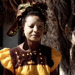 Woman with traditional mask